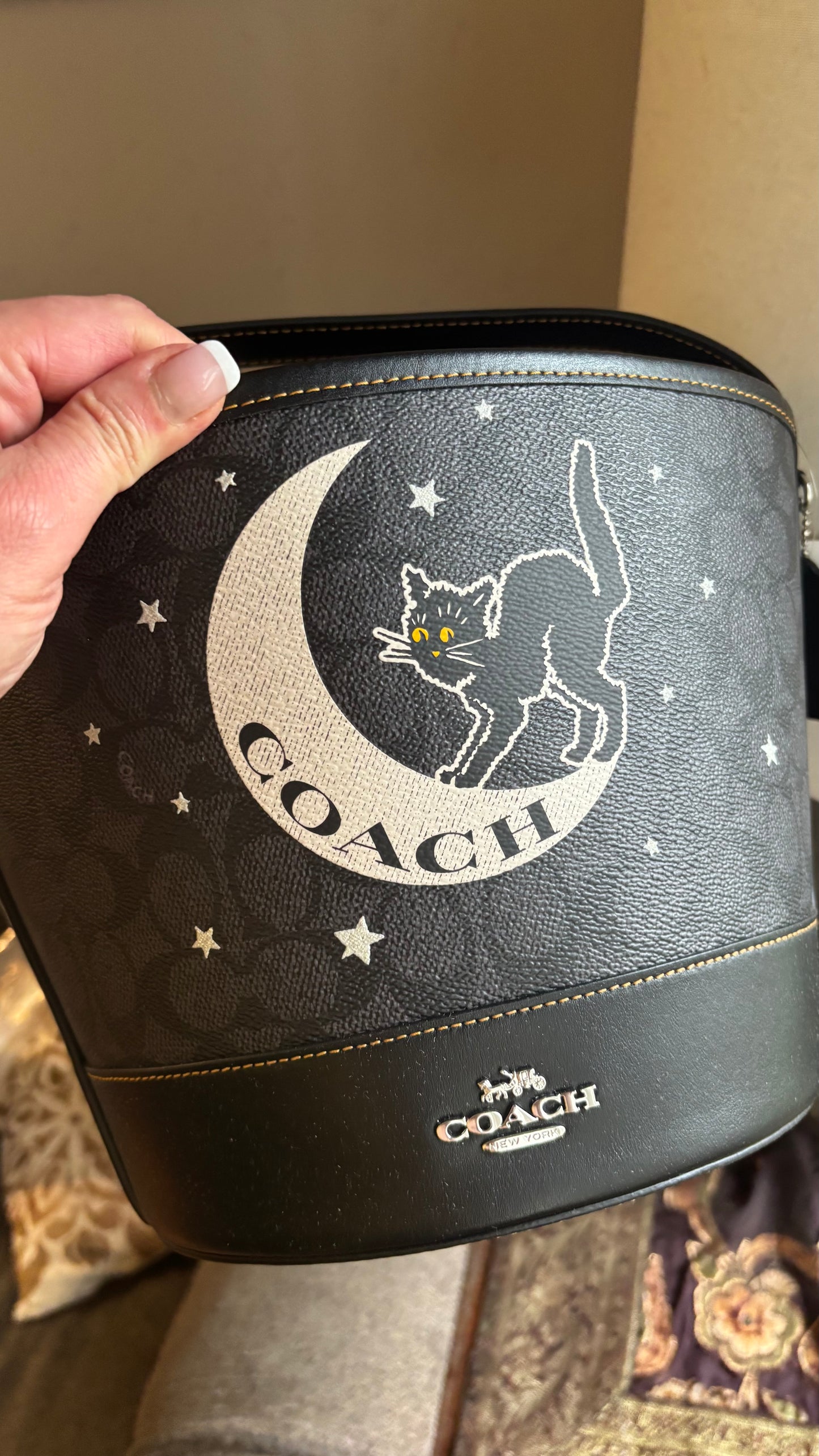 Authentic Coach Signature/Smooth leather w Celestial Cat Design bucket shoulder Ruby Luxury