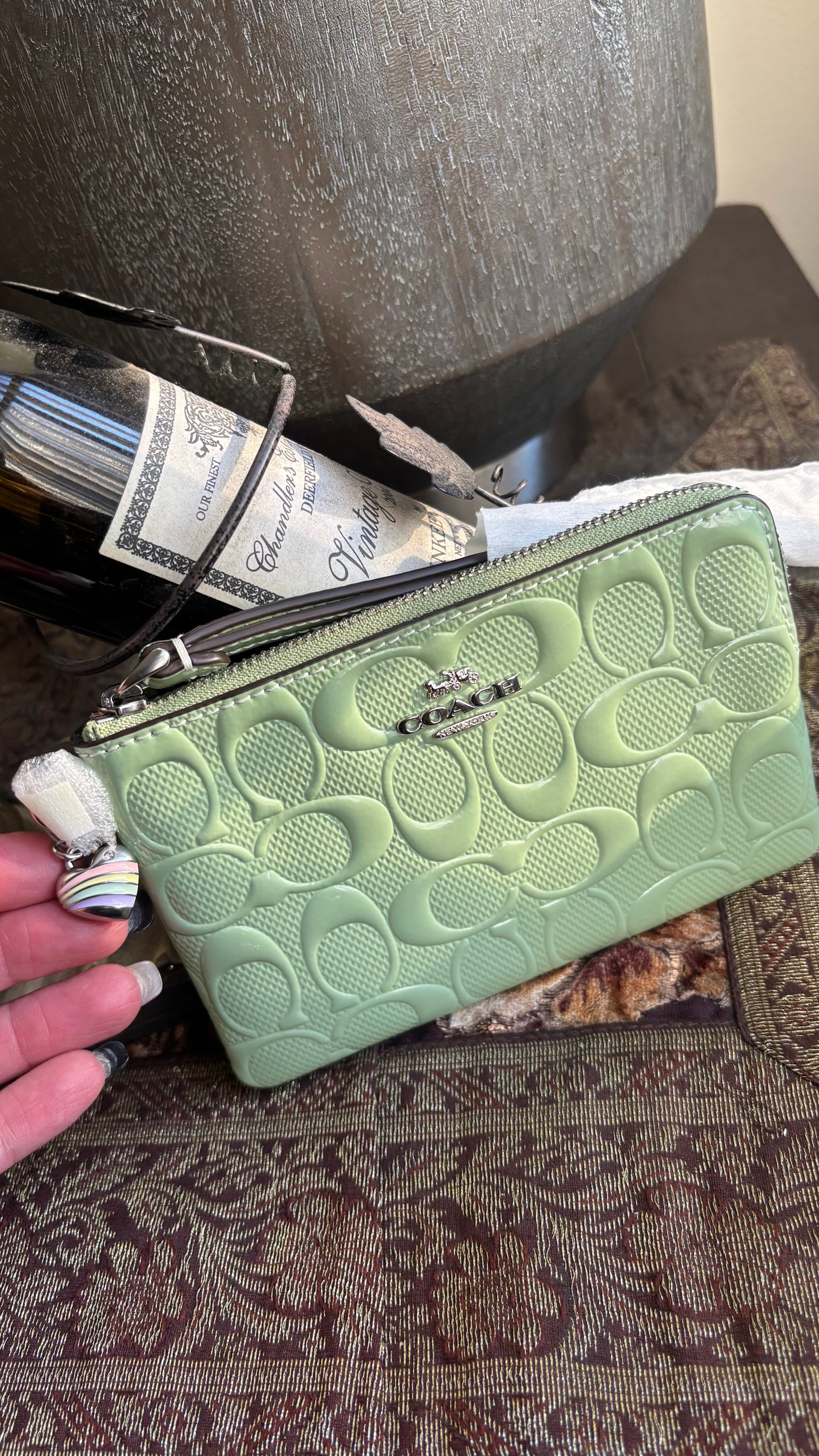 Authentic COACH patent signature leather zip top wristlet with a heart charm New with tags - Ruby Luxury