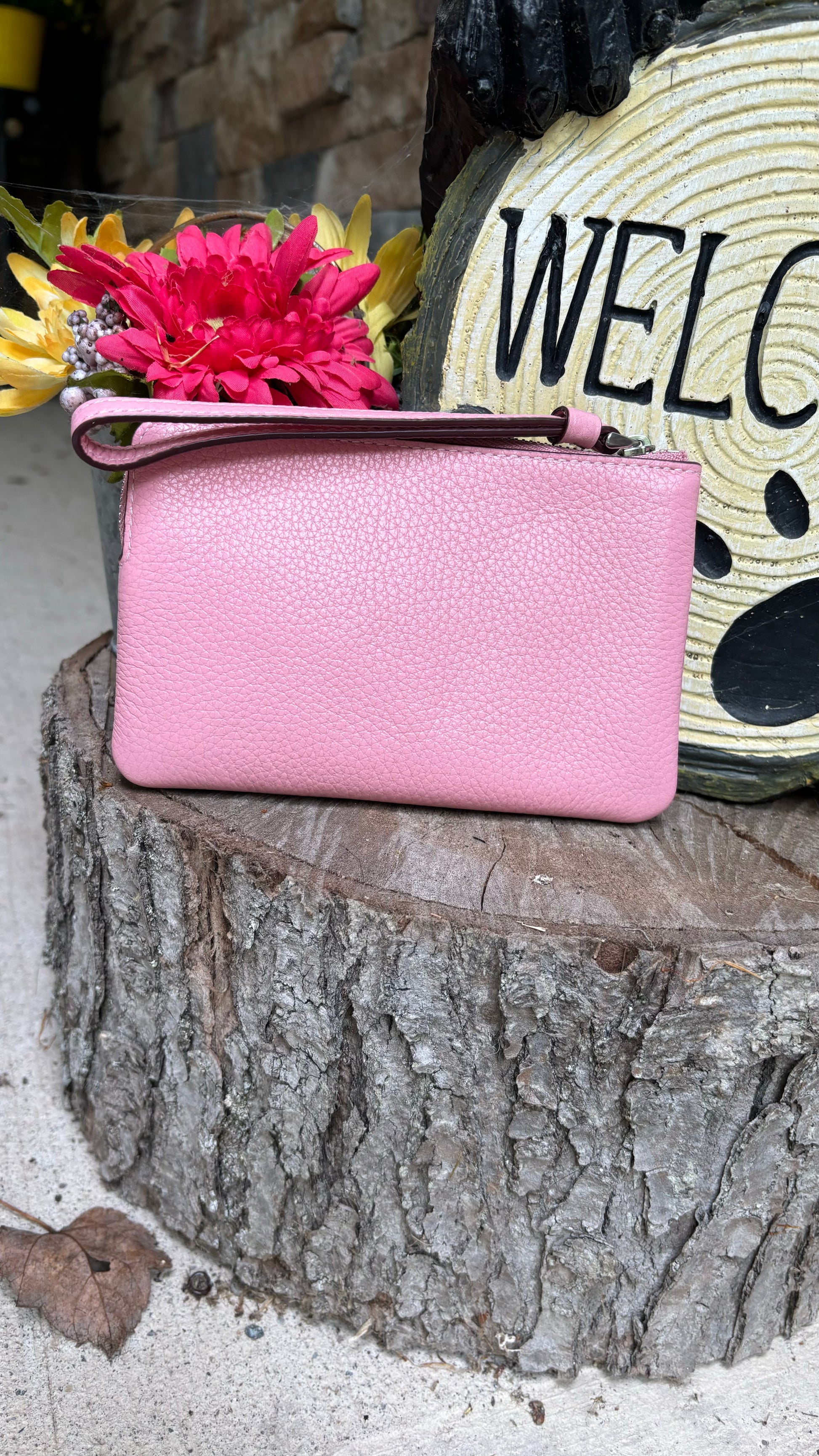 Authentic COACH pebbled leather zip top wristlet 
New with tags - Ruby Luxury
