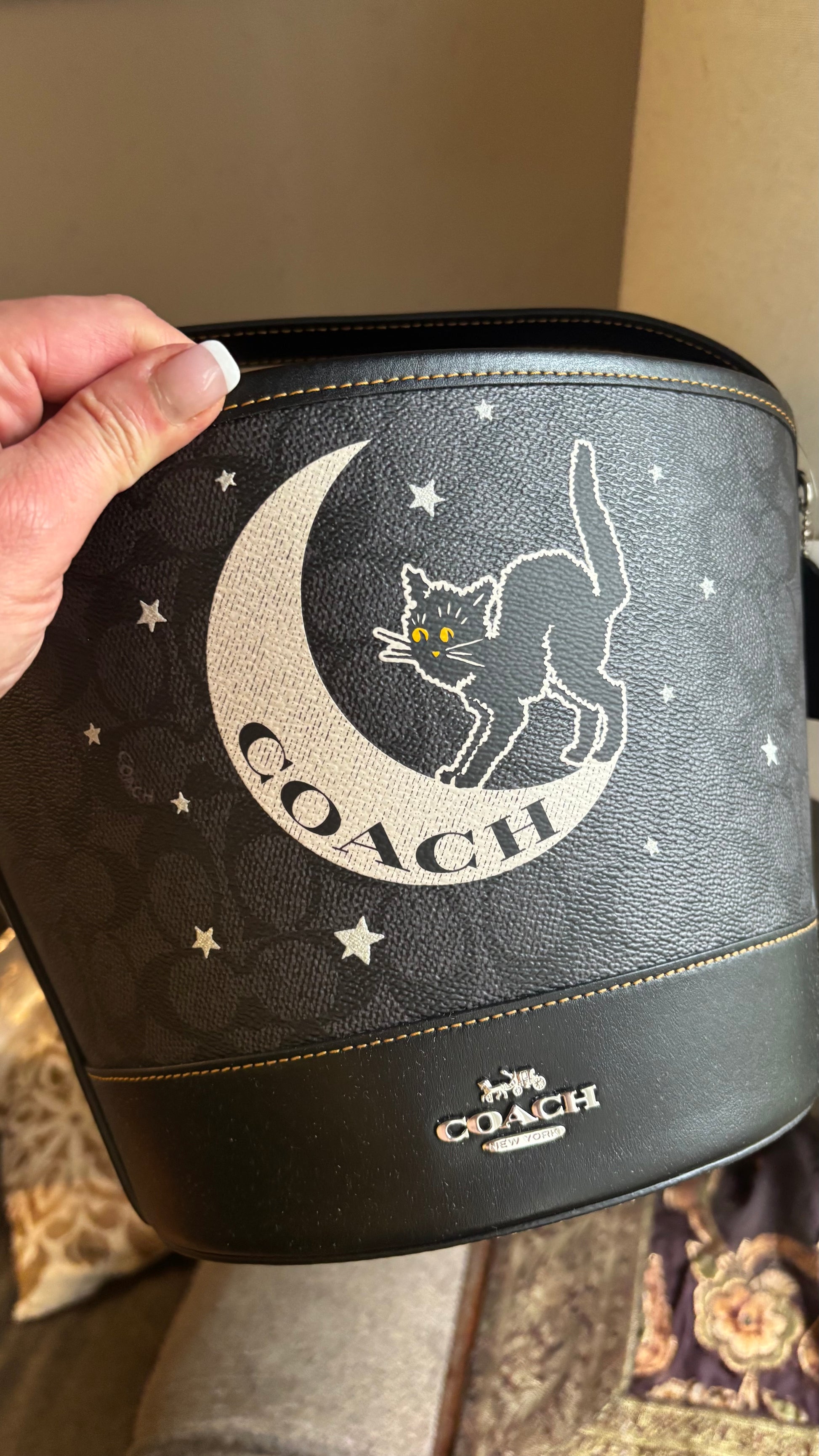 Authentic Coach Signature/Smooth leather w Celestial Cat Design bucket shoulder Ruby Luxury