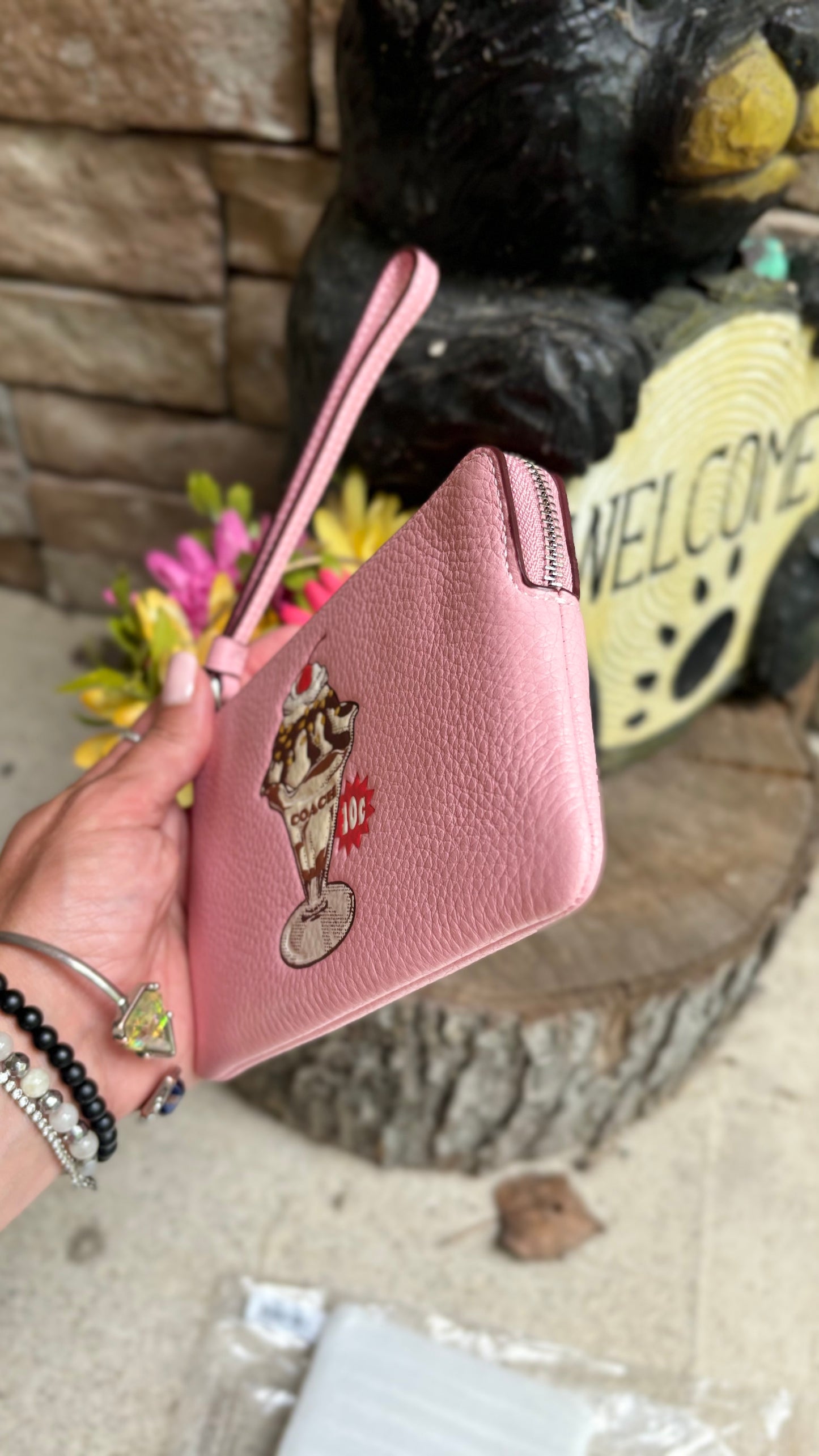 Authentic COACH pebbled leather zip top wristlet 
New with tags - Ruby Luxury