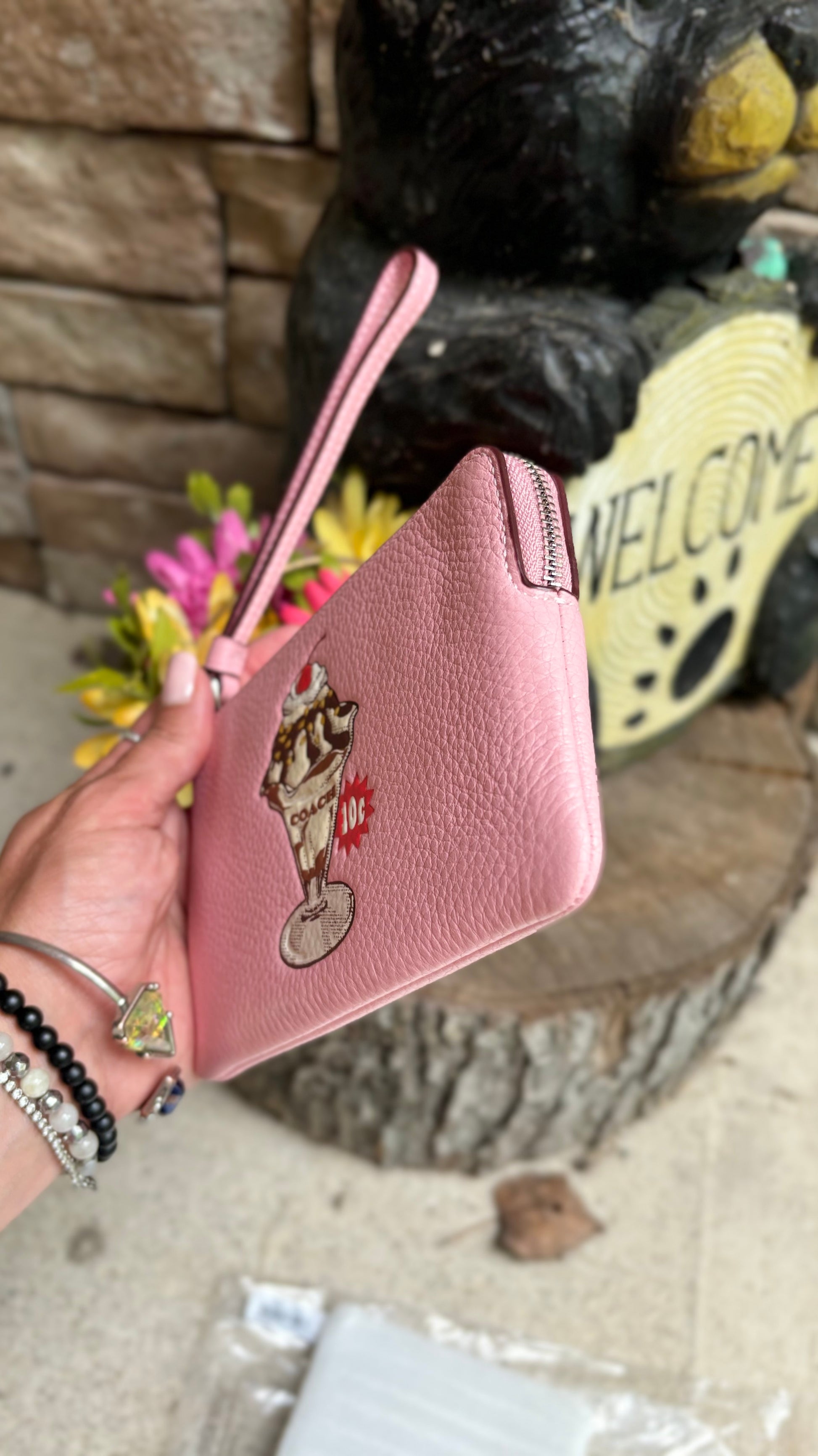 Authentic COACH pebbled leather zip top wristlet 
New with tags - Ruby Luxury