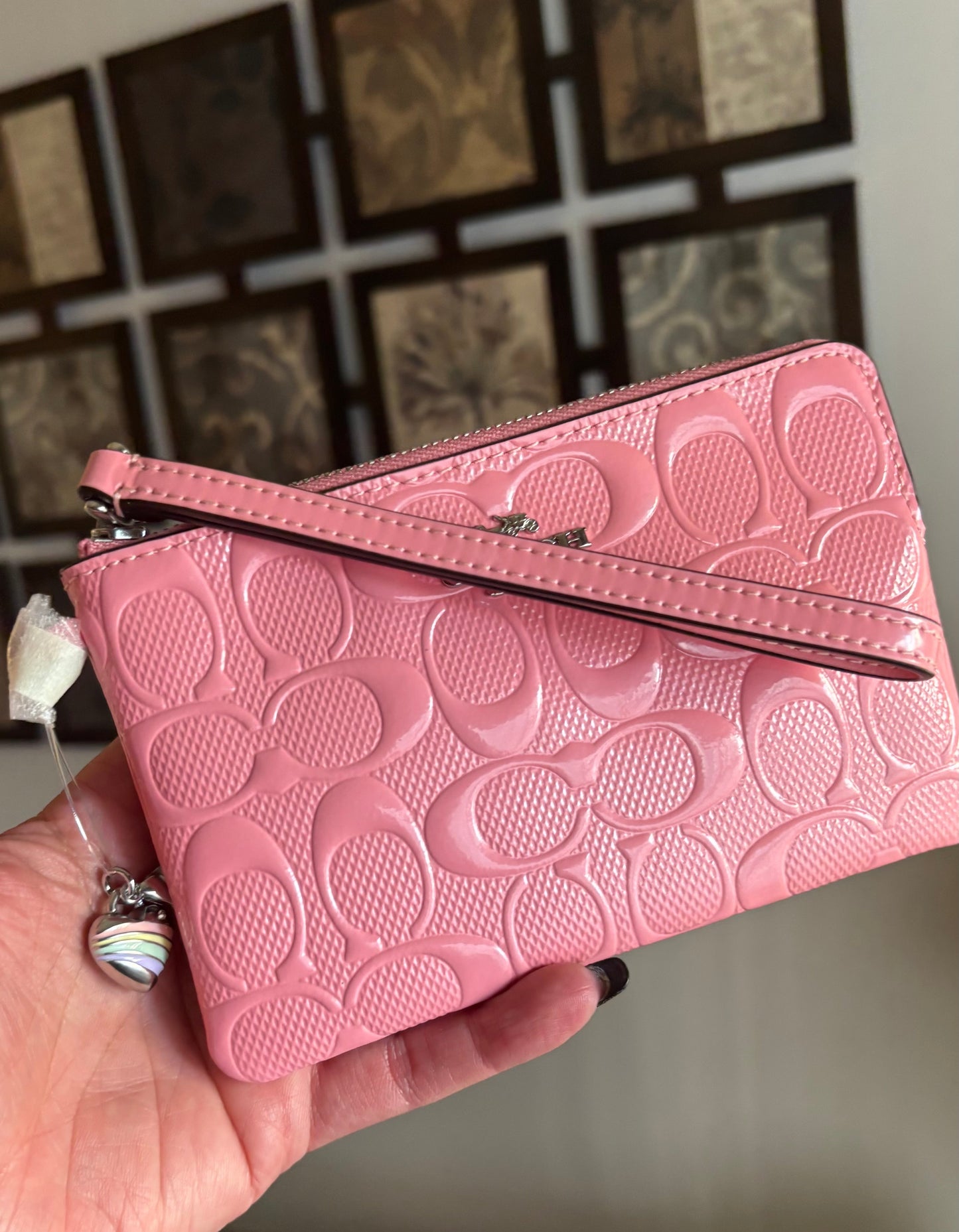 Authentic COACH patent signature leather zip top wristlet with a heart charm  New with tags - Ruby Luxury