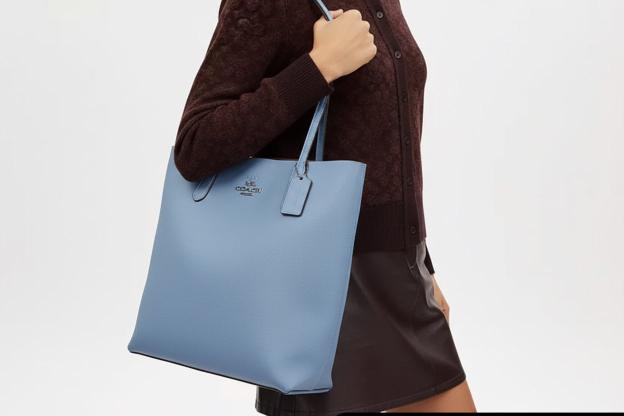 Authentic COACH Pebbled leather/suede snap long Tote
New with tags Ruby Luxury