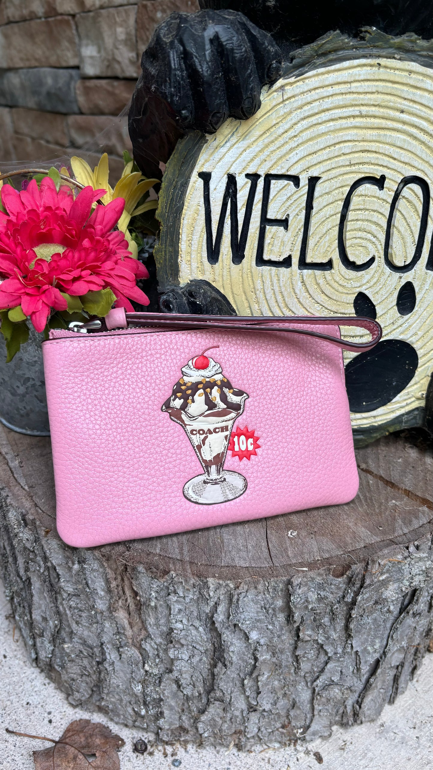 Authentic COACH pebbled leather zip top wristlet 
New with tags - Ruby Luxury