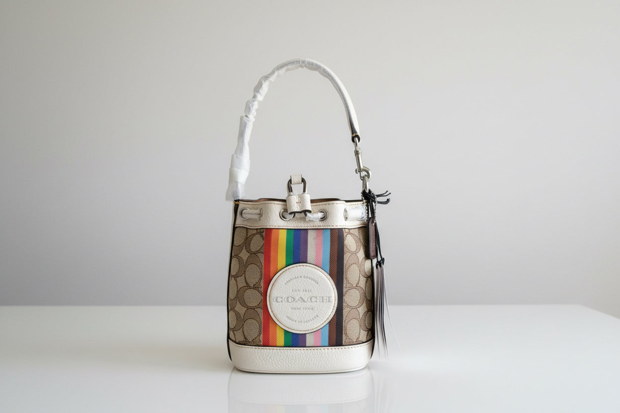 Authentic COACH Signature jacquard/refined leather rainbow logo drawstrings crossbody /satchel Ruby Luxury