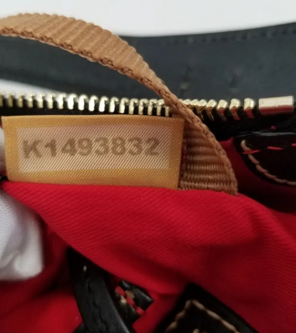 Authentic Dooney & Bourke leather Zebra Print zip top shoulder Bag Ruby Luxury