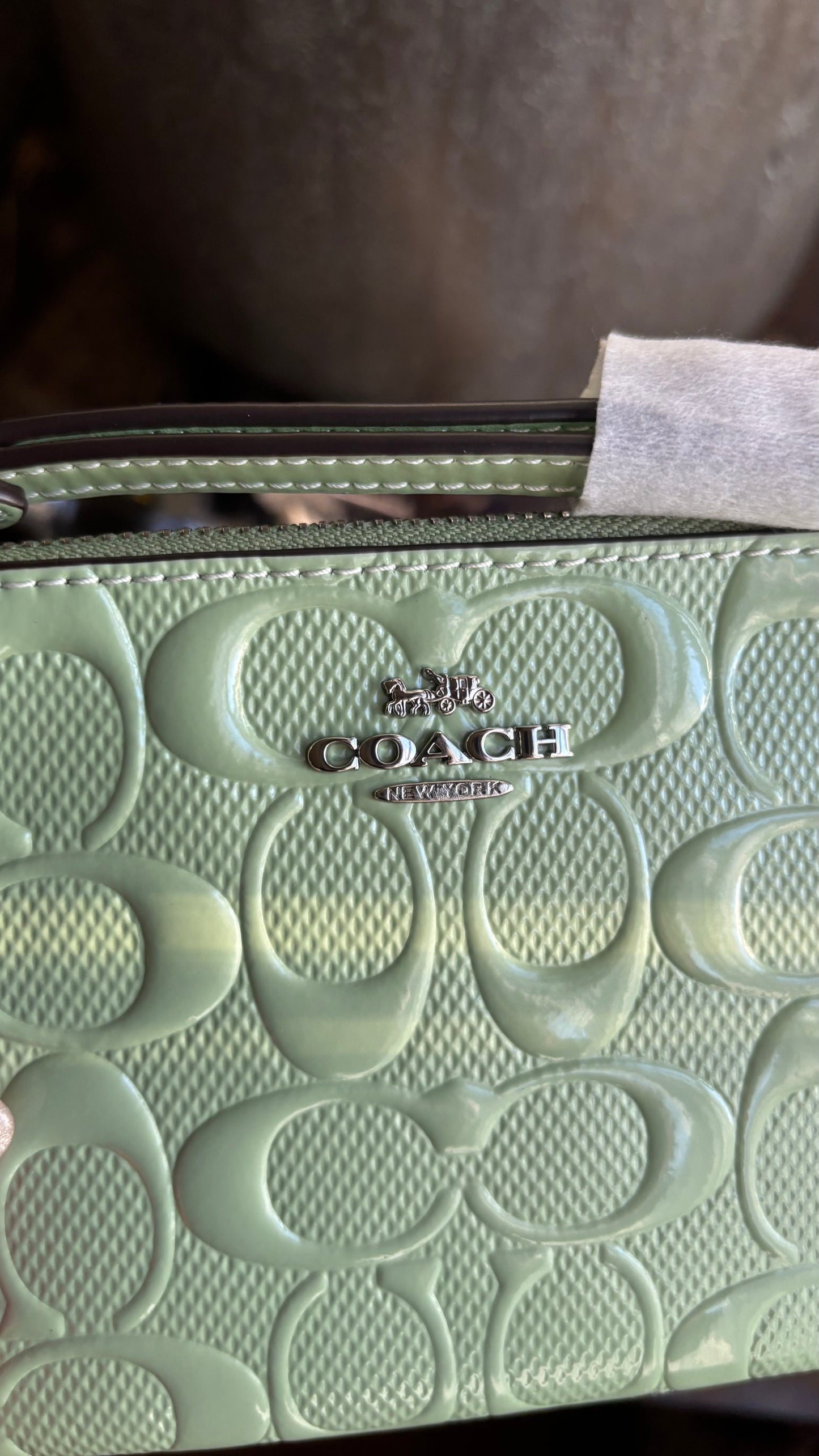 Authentic COACH patent signature leather zip top wristlet with a heart charm  New with tags - Ruby Luxury