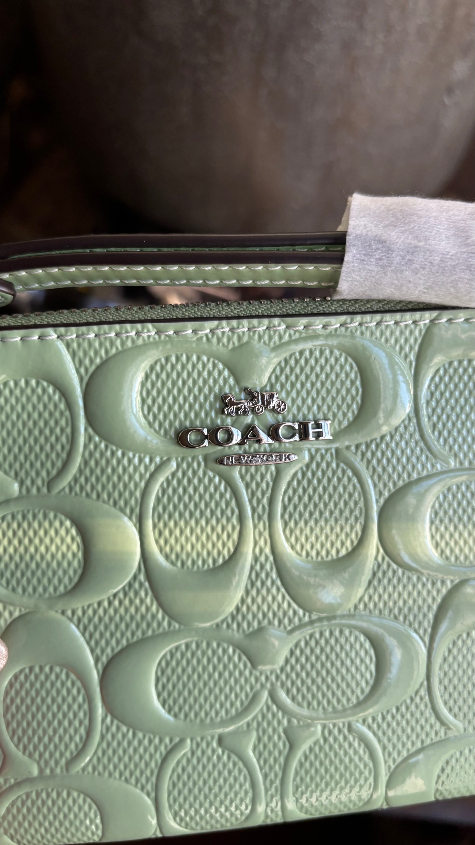 Authentic COACH patent signature leather zip top wristlet with a heart charm  New with tags - Ruby Luxury