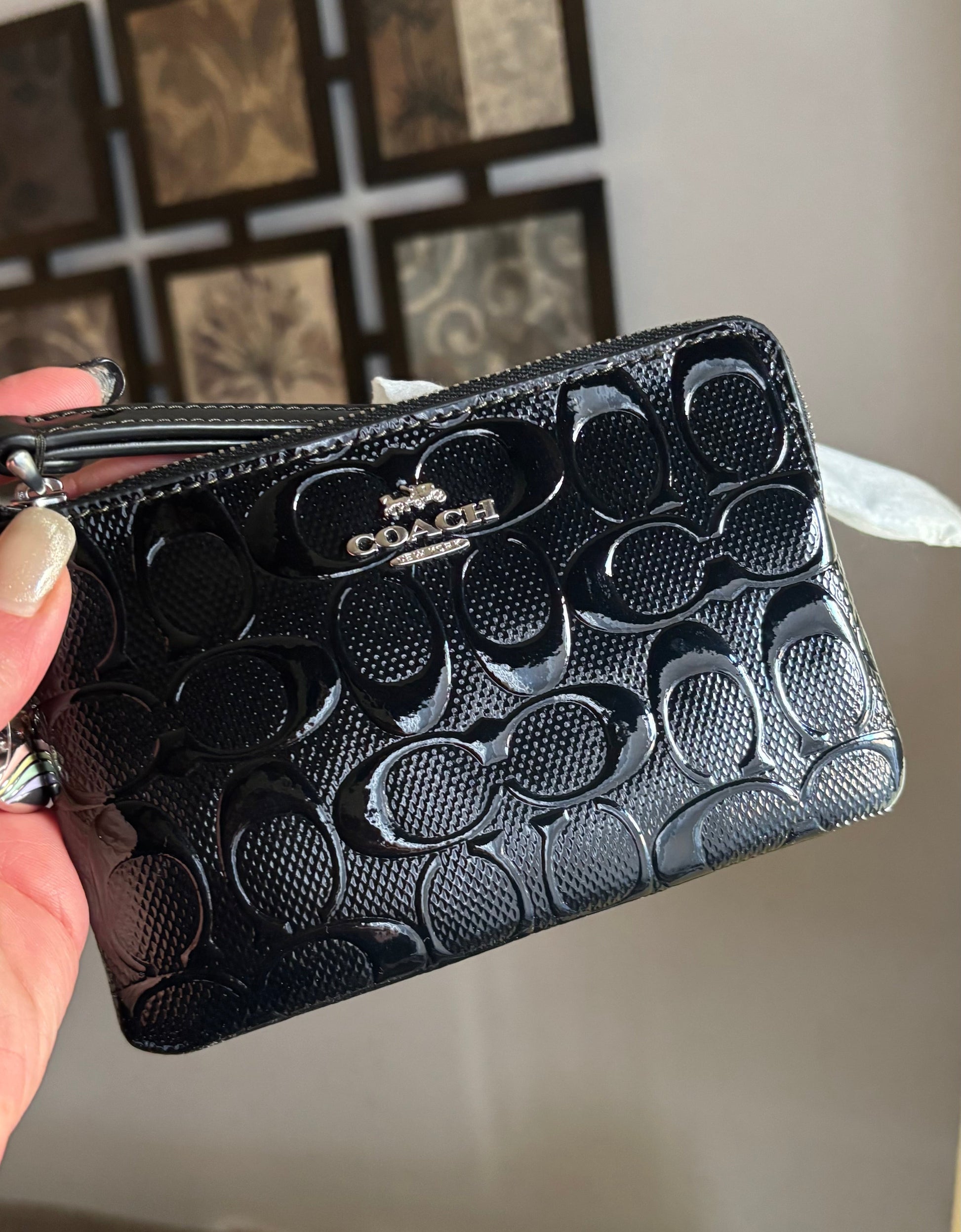 Authentic COACH patent signature leather zip top wristlet with a heart charm 
New with tags - Ruby Luxury