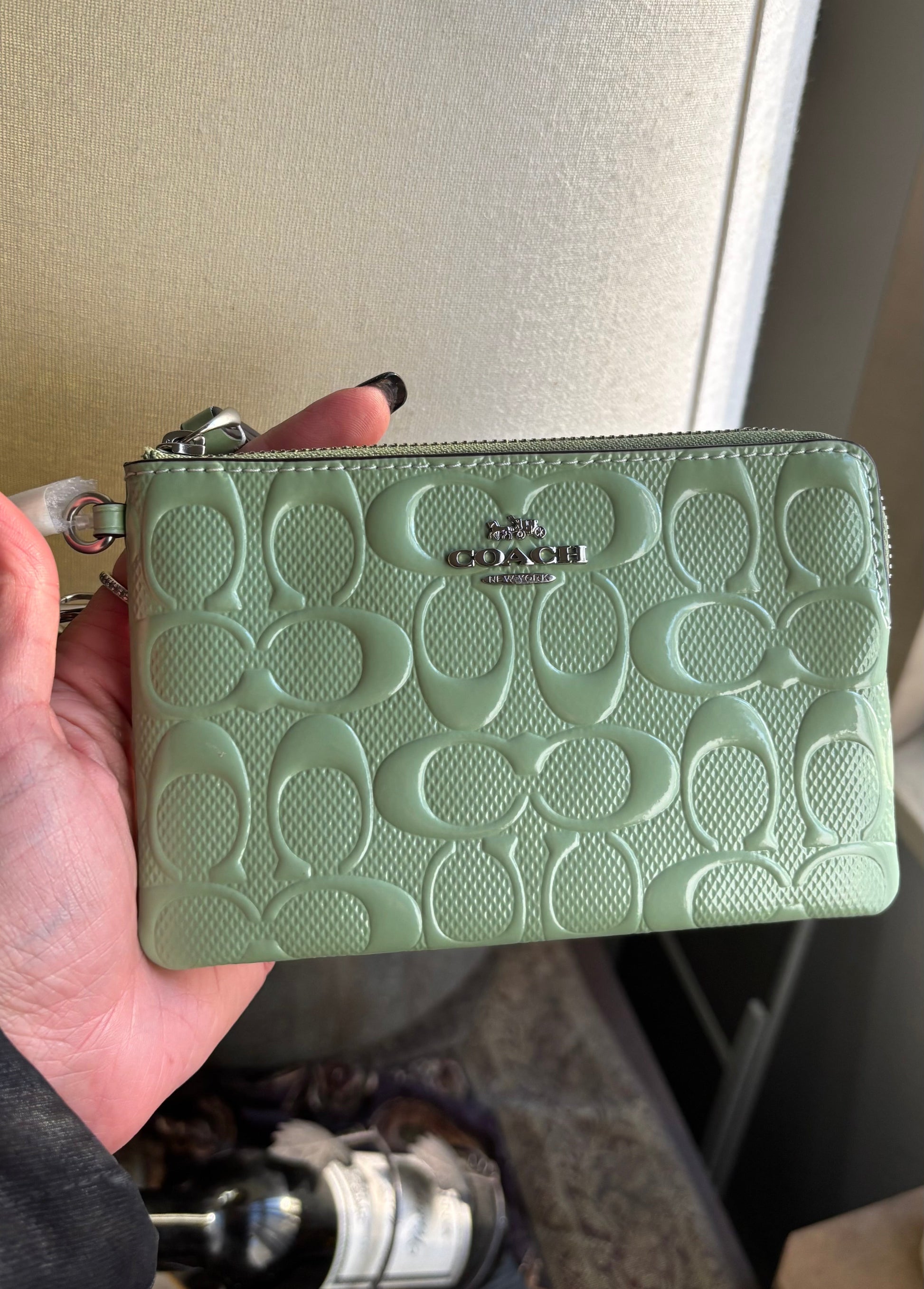 Authentic COACH patent signature leather zip top wristlet with a heart charm  New with tags - Ruby Luxury