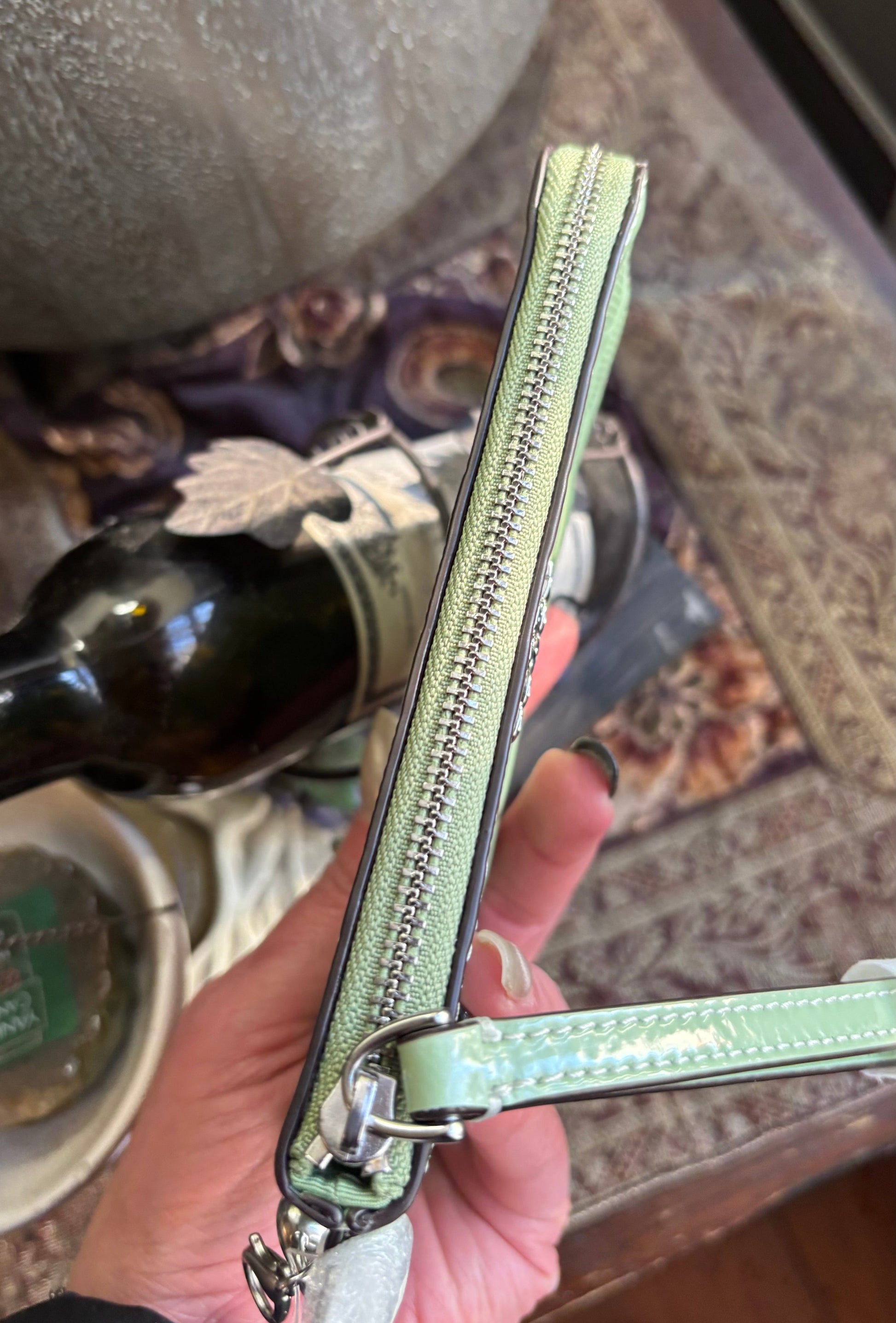 Authentic COACH patent signature leather zip top wristlet with a heart charm  New with tags - Ruby Luxury