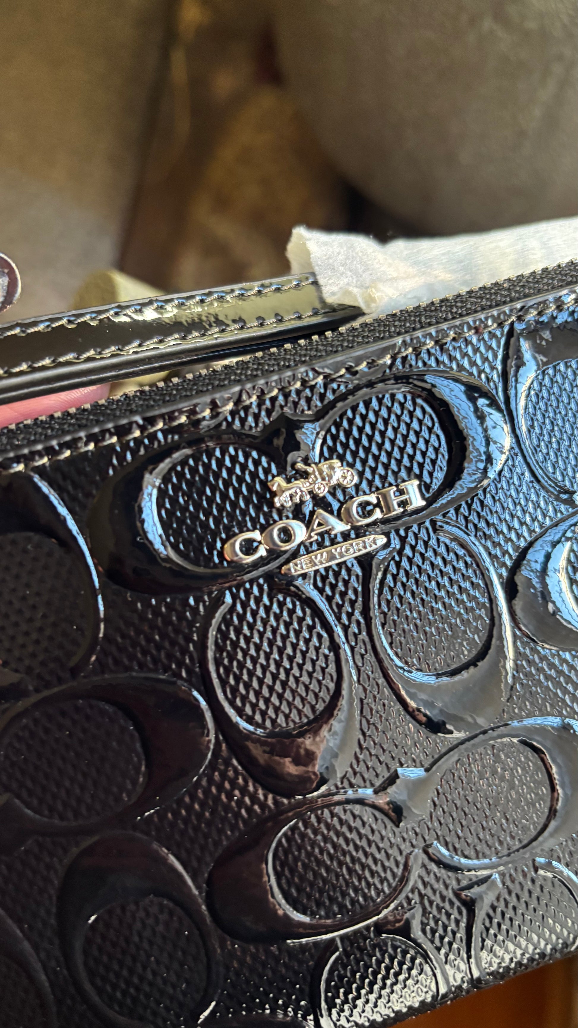 Authentic COACH patent signature leather zip top wristlet with a heart charm 
New with tags - Ruby Luxury