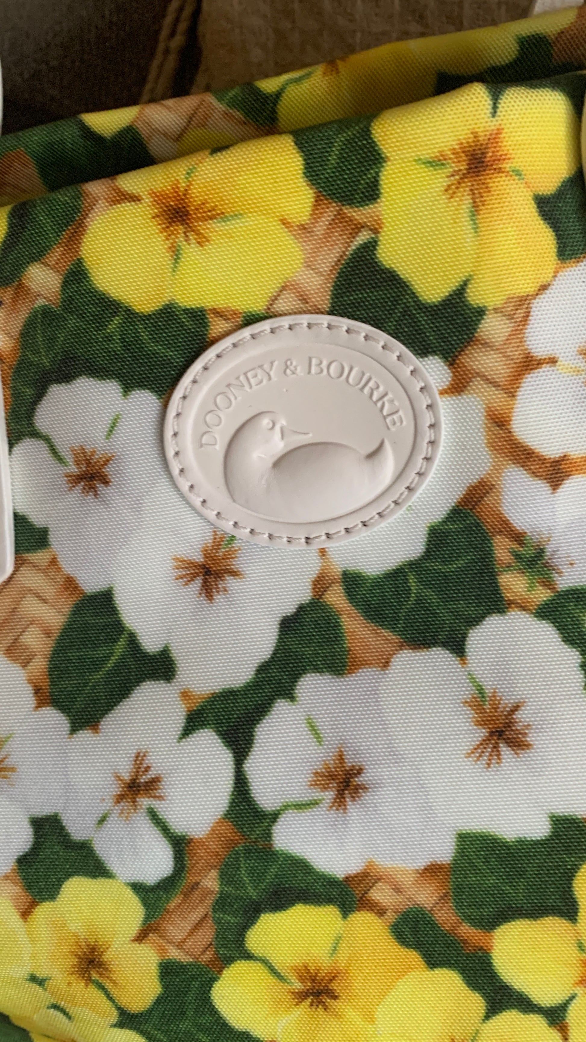 Authentic DOONEY & BOURKE Daisies floral Canvas/leather snap closure tote 
New with tag Ruby Luxury