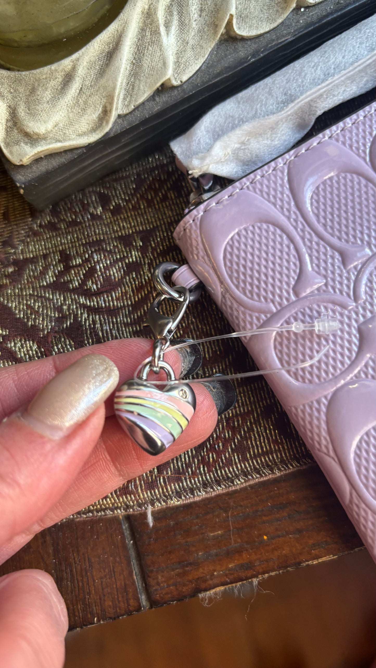 Authentic COACH patent signature leather zip top wristlet with a heart charm  New with tags - Ruby Luxury