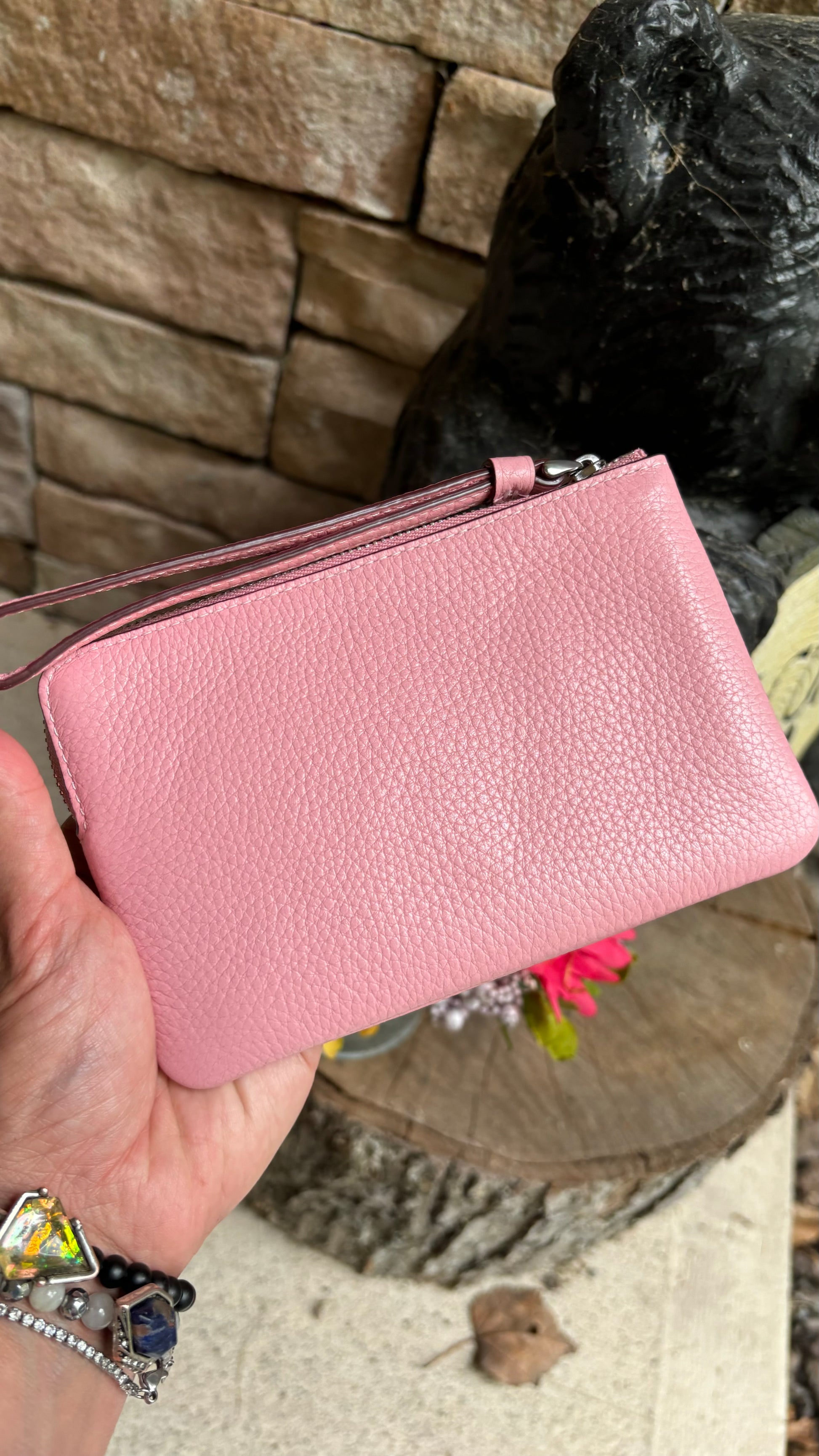 Authentic COACH pebbled leather zip top wristlet 
New with tags - Ruby Luxury