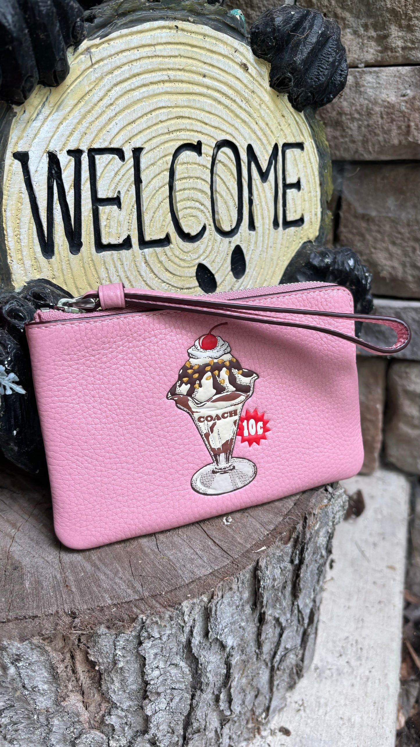 Authentic COACH pebbled leather zip top wristlet 
New with tags - Ruby Luxury