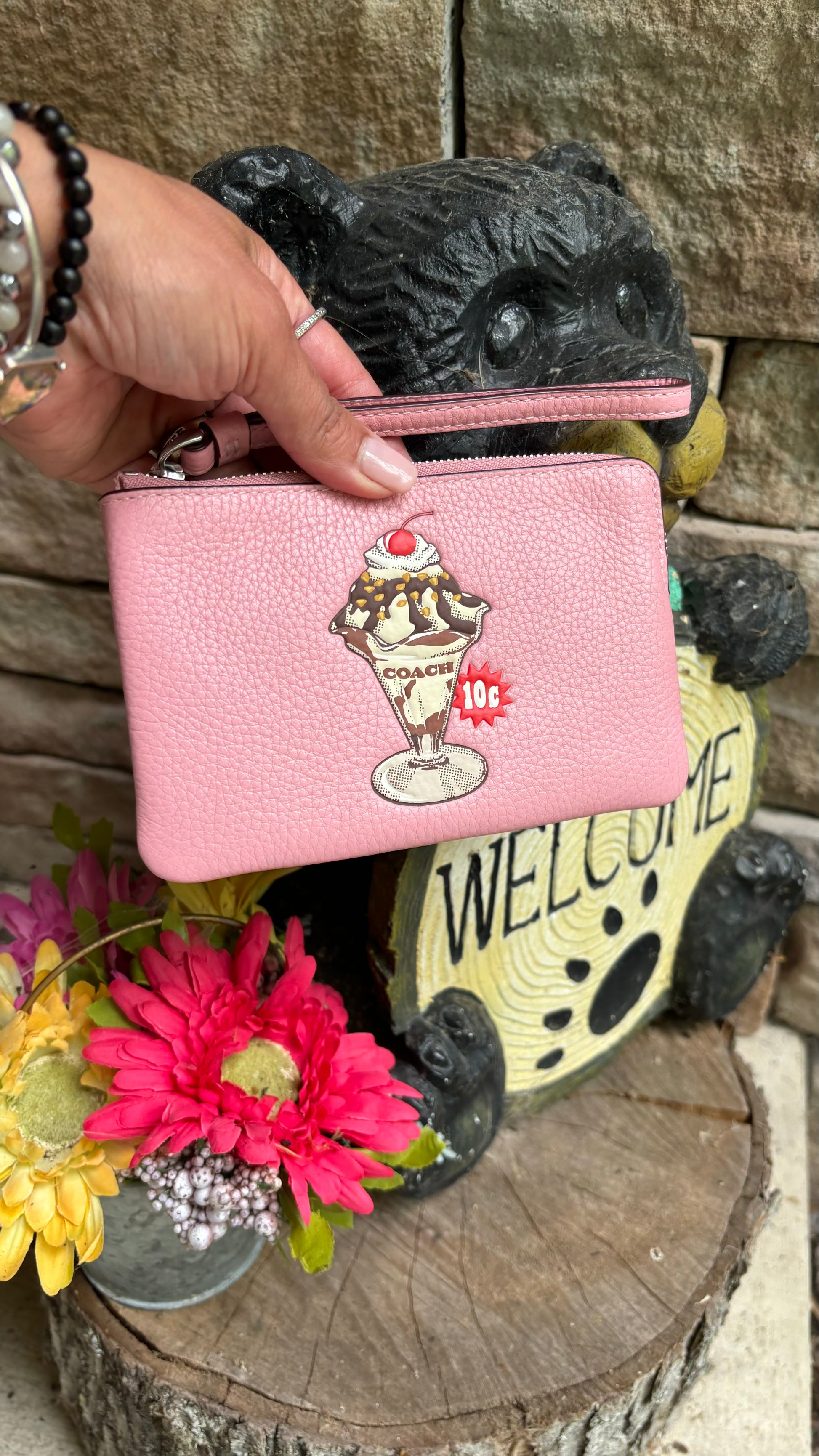 Authentic COACH pebbled leather zip top wristlet 
New with tags - Ruby Luxury